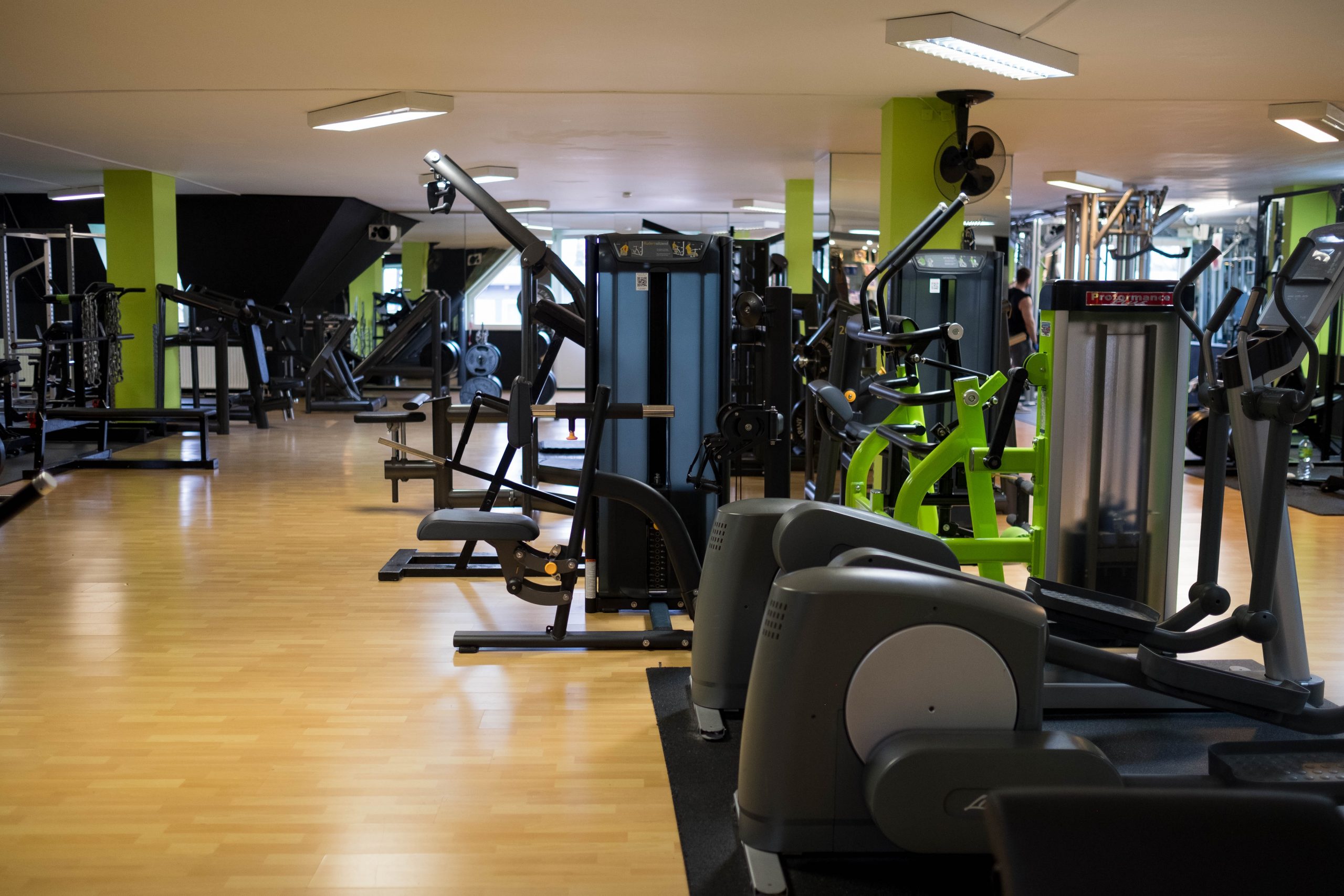A school gym including cross trainers and weight training equipment